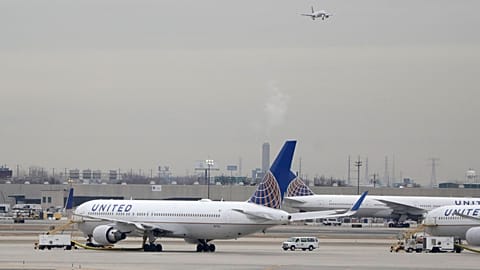 In this Jan. 23, 2019 file photo, United Airlines jets are seen as a plane approaches Newark Liberty International Airport, in Newark, N.J.