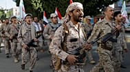 PHOTO D'ARCHIVE : Des partisans houthis défilent pour l'anniversaire de l'unité yéménite à Sana'a, 22 mai 2024