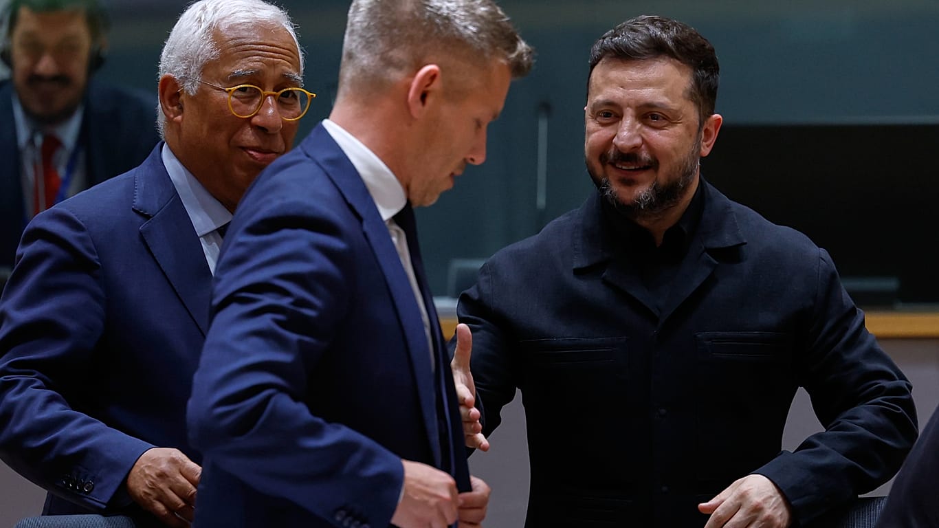 Ukraine's President Volodymyr Zelenskyy, right, greets Hungary's Prime Minister Peter Magyar, center, next to European Council President Antonio Costa during a round table mee