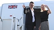 Britain's Prime Minister Andy Burnham and his wife Marie-France van Heel board a plane for the United States, at Stansted Airport, Stansted, England, Monday Sept. 21, 2026,