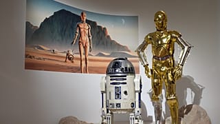 R2-D2 and John Mollo's C-3PO costume are displayed at the Lucas Museum of Narrative Art preview on 31 August 2026 in Los Angeles.