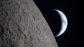 The Artemis II crew captured this view as the Earth sets behind the Moon during a lunar flyby, 6 April, 2026