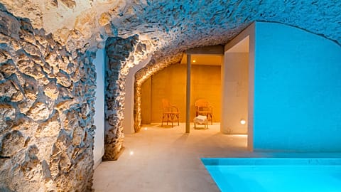 Can Mascort Eco Hotel, one of the most affordable Michelin Key hotels in Europe, has a Roman Bath-inspired spa area