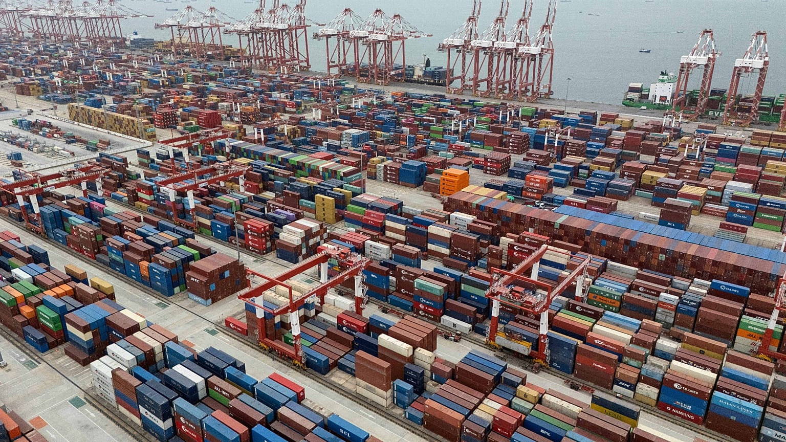 FILE. Shipping containers are seen ready for transport at the Guangzhou Port in the Nansha district in southern China's Guangdong province, 17 April 2025