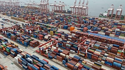 FILE. Shipping containers are seen ready for transport at the Guangzhou Port in the Nansha district in southern China's Guangdong province, 17 April 2025