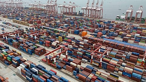 FILE. Shipping containers are seen ready for transport at the Guangzhou Port in the Nansha district in southern China's Guangdong province, 17 April 2025