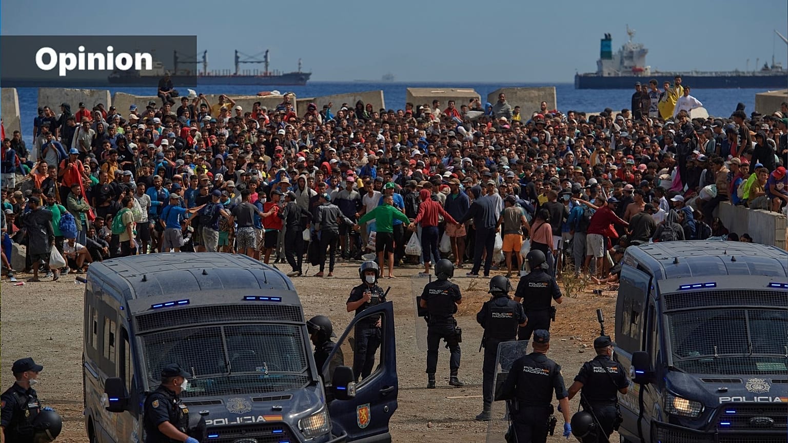 Migrants who crossed from Morocco into Ceuta (Spain) return to a beach after being expelled from the area the previous day, Aug. 21, 2026. (AP Photo/Antonio Sempere)