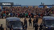 Migrants who crossed from Morocco into Ceuta (Spain) return to a beach after being expelled from the area the previous day, Aug. 21, 2026. (AP Photo/Antonio Sempere)
