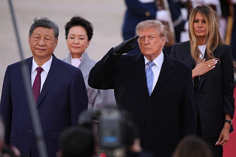 President Donald Trump and first lady Melania Trump greet Chinese President Xi Jinping and his wife Peng Liyuan as they arrive at Joint Base Andrews, Md., Wednesday, Sept. 23,