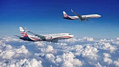 FILE - Two Boeing 737 MAX Aircraft with Aviation Capital Group Livery in Flight. (Photo: Business Wire) / AP