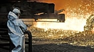 A steel worker watches the hot metal at the Thyssenkrupp steel factory in Duisburg, Germany, 27 April 2018. Duisburg is the biggest steel producer site in Europe.