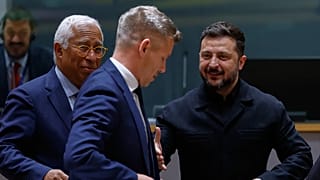 Ukraine's President Volodymyr Zelenskyy, right, greets Hungary's Prime Minister Peter Magyar, center, next to European Council President Antonio Costa during a round table mee