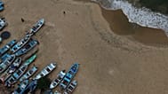 Fishing boats sit on Manzanillo beach for safe keeping after Hurricane Erick hit near Acapulco, Mexico, Thursday, June 19, 2025.