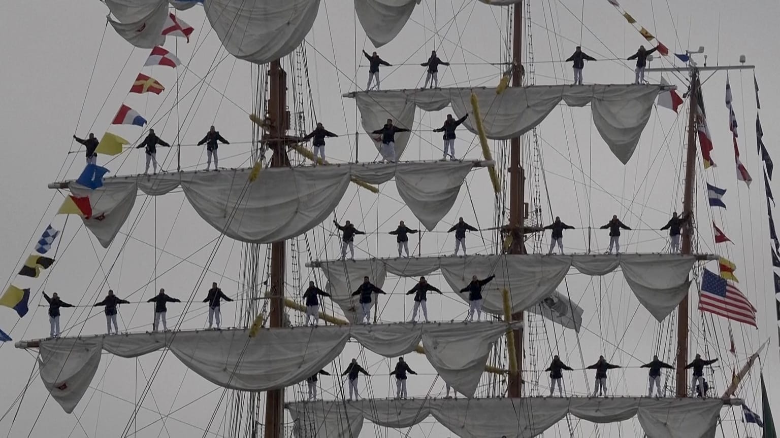 Cuauhtémoc docking along the Embarcadero near the Bay Bridge, San Francisco, USA as sailors stand on masts while singing, Sept. 23, 2026
