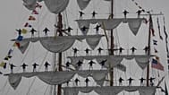 Cuauhtémoc docking along the Embarcadero near the Bay Bridge, San Francisco, USA as sailors stand on masts while singing, Sept. 23, 2026