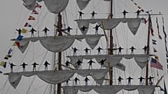 Cuauhtémoc docking along the Embarcadero near the Bay Bridge, San Francisco, USA as sailors stand on masts while singing, Sept. 23, 2026