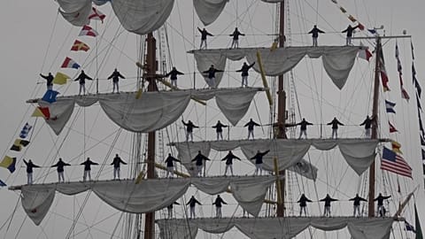 Cuauhtémoc docking along the Embarcadero near the Bay Bridge, San Francisco, USA as sailors stand on masts while singing, Sept. 23, 2026