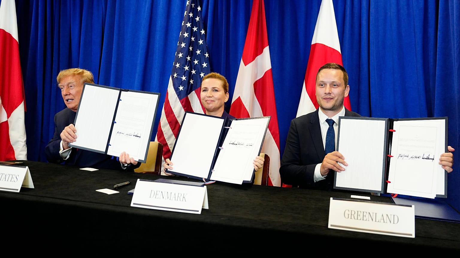 Denmark's Prime Minister, Greenland's Prime Minister, and US President at the signing ceremony of a security deal between the US, Denmark and Greenland at United Nations HQs.