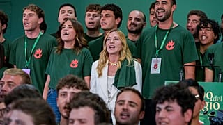 Meloni at a youth rally of her Fratelli d'Italia group 
