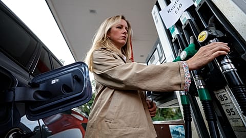 FILE - A customer fills her vehicle at a gas station, in Lille, France, Thursday 17 Sept. 2026. 