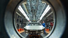 FILE – Workers assemble Volkswagen Golf cars at the company’s plant in Zwickau, Germany, on 22 January 2018.