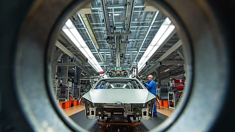 FILE – Workers assemble Volkswagen Golf cars at the company’s plant in Zwickau, Germany, on 22 January 2018.