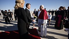 Pope Leo XIV is welcomed by French President Emmanuel Macron and his wife Brigitte at Paris Orly Airport