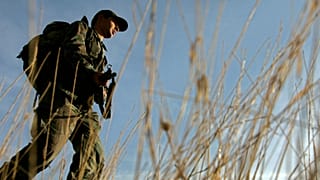 A Turkish soldier patrols the area near the Turkey-Iraq border, in the province of Sirnak, Tuesday, Oct. 23, 2007.