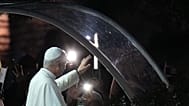 Pope Leo XIV waves to the crowd on his way for a prayer at the Grotto of the Apparitions of Massabielle, in Lourdes, France, Saturday, Sept. 26, 2026. (AP Photo/Laurent Cipria