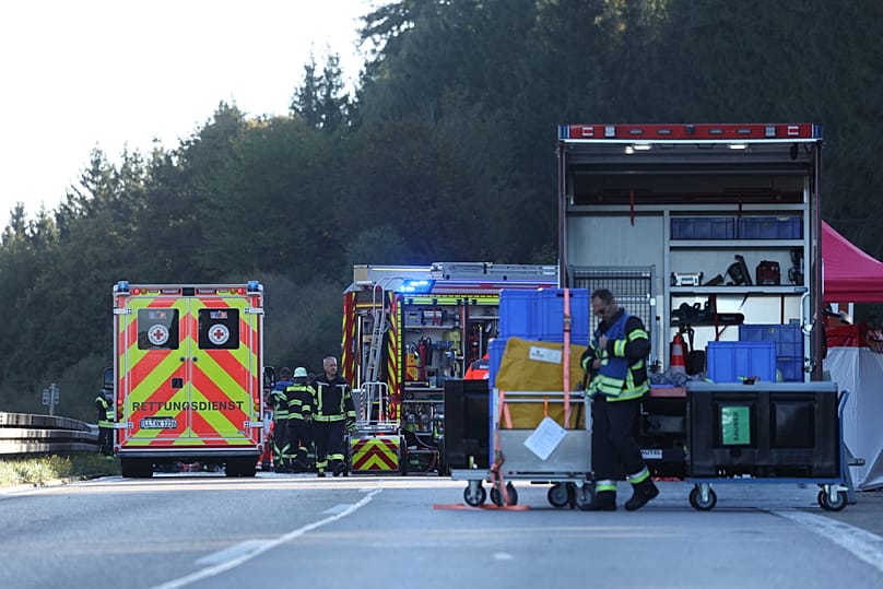 Emergency services at the scene after a tourist bus veered off a highway, in Buchloe, Germany, Sunday, Sept. 27, 2026.