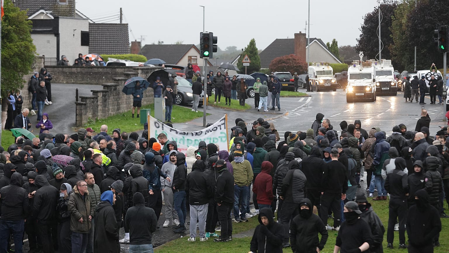 Protesters block the Garvaghy road ahead of a Portadown District Loyal Orange Lodge (LOL) No 1 march in the first parade for almost 30 years
