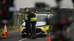 Police officers guard a road leading to RAF Fairford, 28 September, 2026