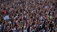 People gather during a protest following the eviction of 87-year-old Maricarmen in Madrid, 26 September, 2026