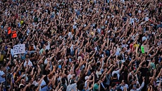 People gather during a protest following the eviction of 87-year-old Maricarmen in Madrid, 26 September, 2026
