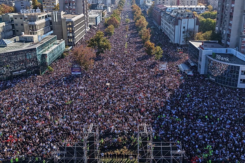 People fill the streets near the train station before observing 16 minutes of silence for the victims of the Novi Sad disaster, 1 November, 2025
