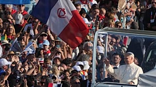 Pope Leo XIV arrives on the popemobile to celebrate Mass at the Sanctuary of Our Lady of Lourdes, Sunday, Sept. 27, 2026.