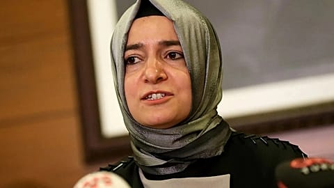 FILE - Fatma Betul Sayan Kaya, Turkey's Minister of Family Affairs, speaks to the media at Ataturk Airport in Istanbul on 12 March 2017. 