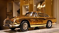 A view of 24-carat gold-plated model of James Bond's Goldfinger Aston Martin DB5, priced at 24,999 pound sterling and one of only seven made in museum quality 1:8 scale by Bri