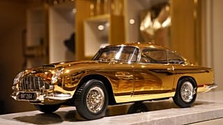 A view of 24-carat gold-plated model of James Bond's Goldfinger Aston Martin DB5, priced at 24,999 pound sterling and one of only seven made in museum quality 1:8 scale by Bri