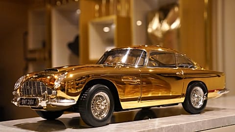 A view of 24-carat gold-plated model of James Bond's Goldfinger Aston Martin DB5, priced at 24,999 pound sterling and one of only seven made in museum quality 1:8 scale by Bri