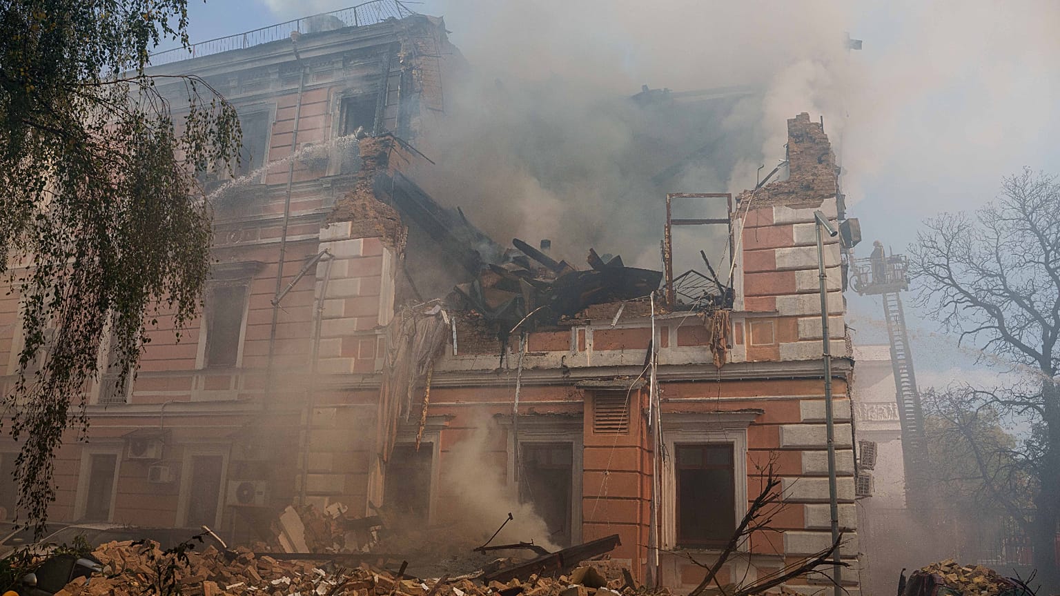 Smoke rises from the National Academy of science building damaged after a Russian drone strike on central Kyiv, Ukraine, Monday, Sept. 28, 2026.