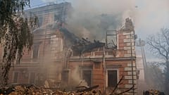 Smoke rises from the National Academy of science building damaged after a Russian drone strike on central Kyiv, Ukraine, Monday, Sept. 28, 2026.