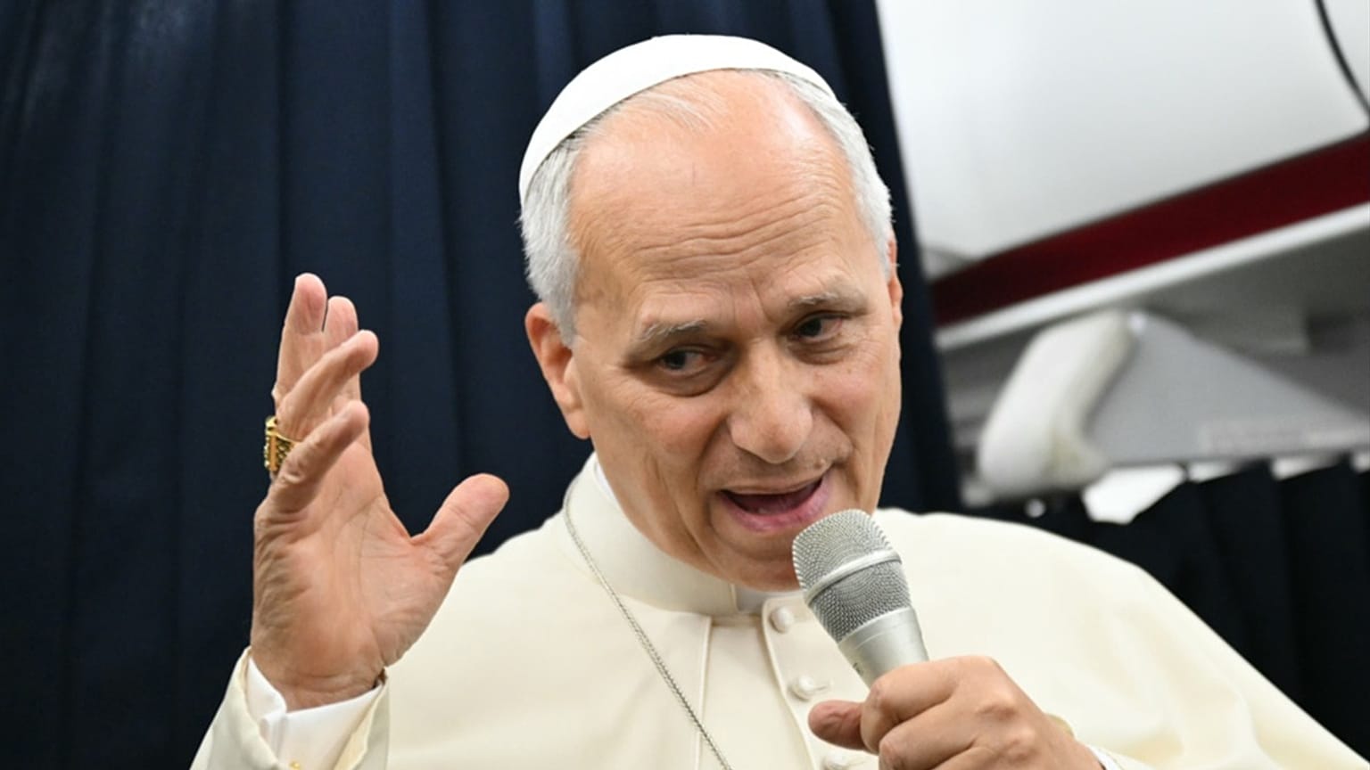 Pope Leo XIV speaks to journalists aboard the flight from Metz, France, to Rome, at the end of his four-day visit to France, Monday, Sept. 28, 2026