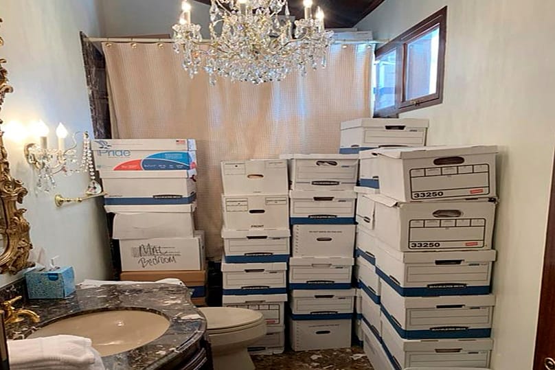 FILE - Boxes of records stored in a bathroom and shower in the Lake Room at Trump's Mar-a-Lago estate in Palm Beach, Florida