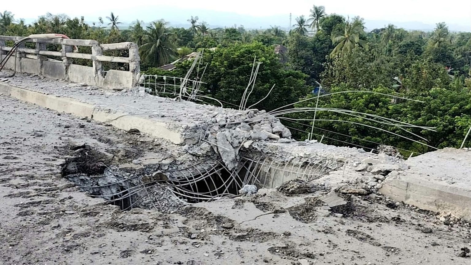 A damaged section of a bridge is seen after a market in an adjacent area was allegedly hit by the military’s airstrike in Kyauktaw, Rakhine, Myanmar, Monday, Sept.28, 2026