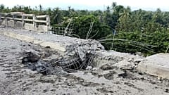 A damaged section of a bridge is seen after a market in an adjacent area was allegedly hit by the military’s airstrike in Kyauktaw, Rakhine, Myanmar, Monday, Sept.28, 2026
