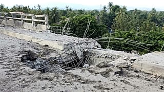 A damaged section of a bridge is seen after a market in an adjacent area was allegedly hit by the military’s airstrike in Kyauktaw, Rakhine, Myanmar, Monday, Sept.28, 2026