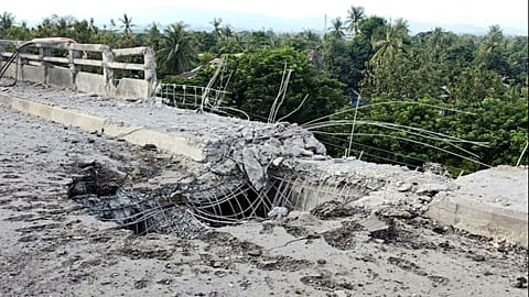 A damaged section of a bridge is seen after a market in an adjacent area was allegedly hit by the military’s airstrike in Kyauktaw, Rakhine, Myanmar, Monday, Sept.28, 2026