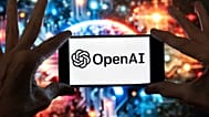 FILE - The OpenAI logo is displayed on a cell phone in front of an image generated by ChatGPT's Dall-E text-to-image model, Dec. 8, 2023, in Boston