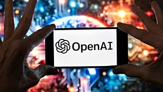 FILE - The OpenAI logo is displayed on a cell phone in front of an image generated by ChatGPT's Dall-E text-to-image model, Dec. 8, 2023, in Boston